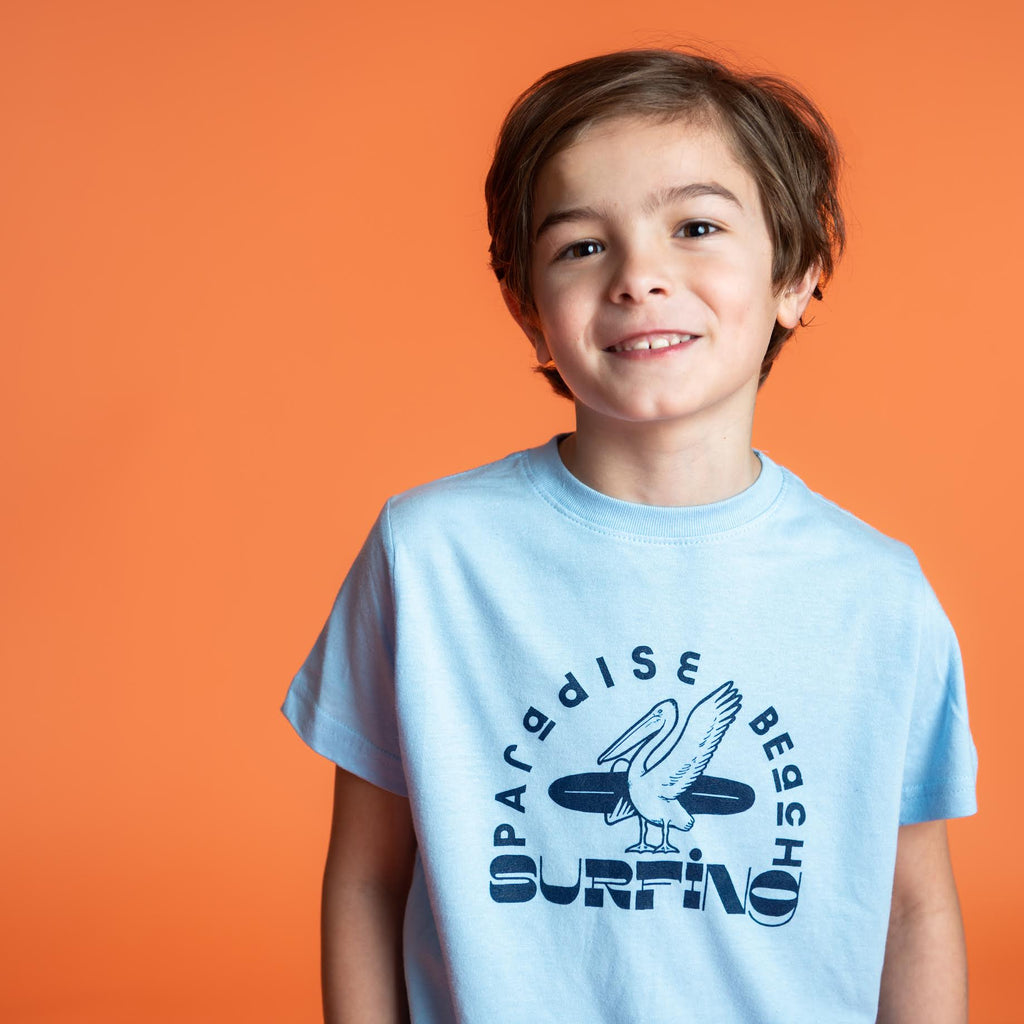 boy wearing a Paradise Beach Surfing T-Shirt