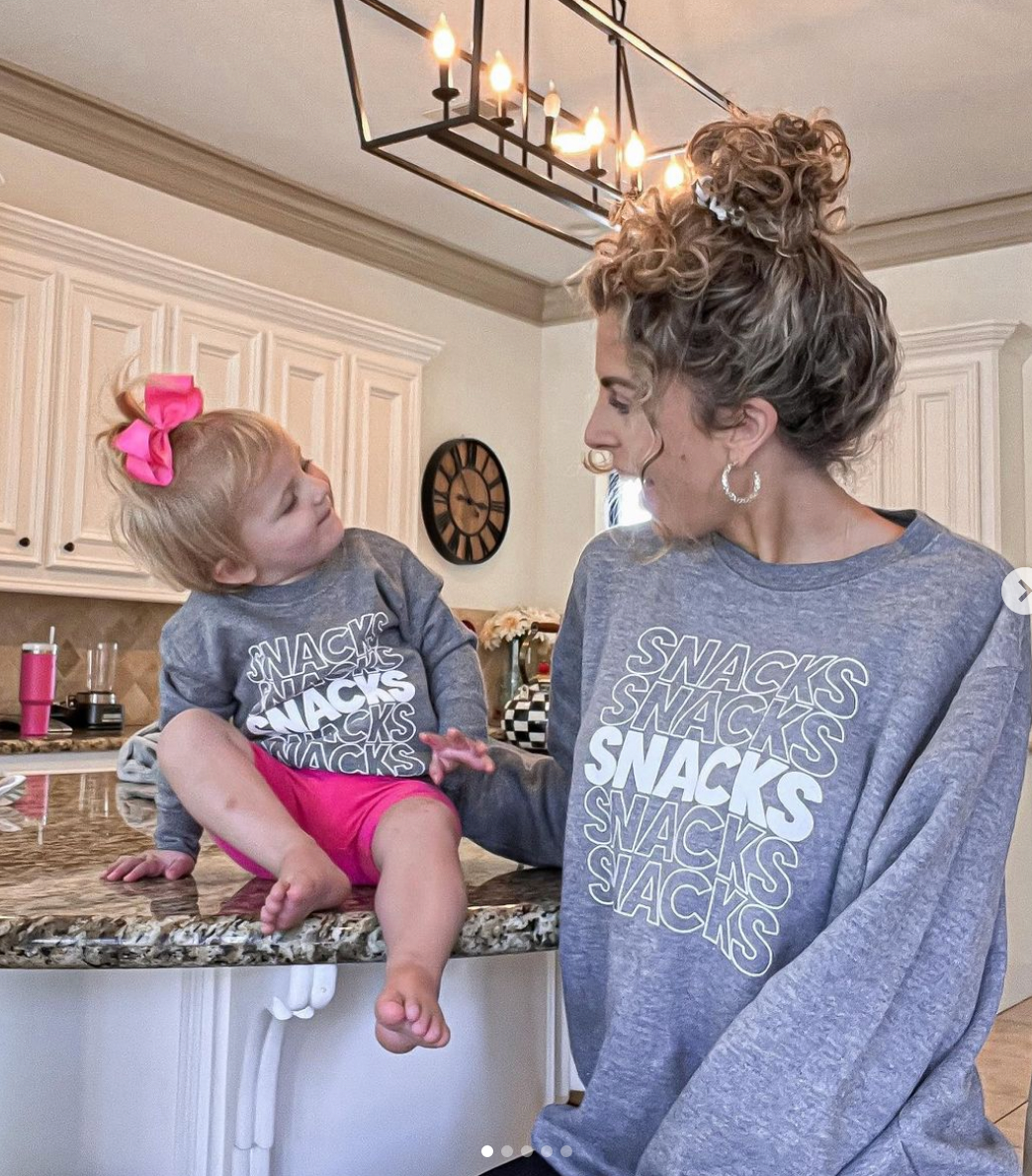 mom wearing a Snacks Crewneck Sweatshirt