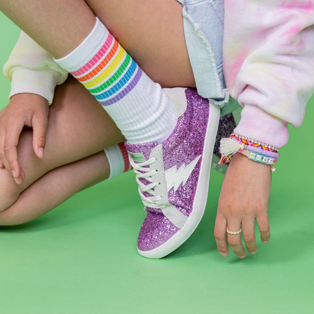 girl wearing purple glitter ziggy shoes