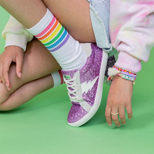 girl wearing purple glitter ziggy shoes
