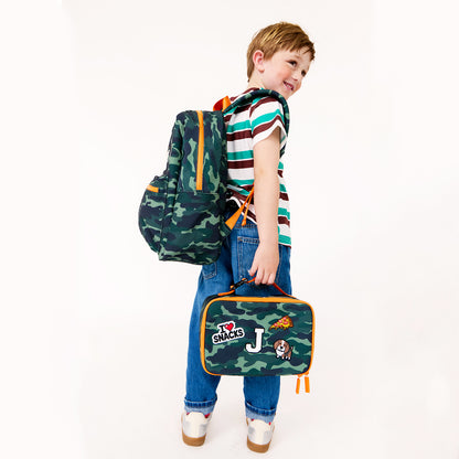 boy with camo backpack and lunch box