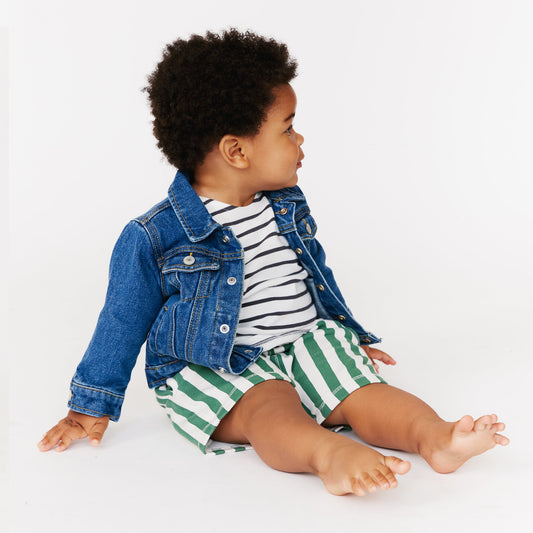 baby in customized denim jacket