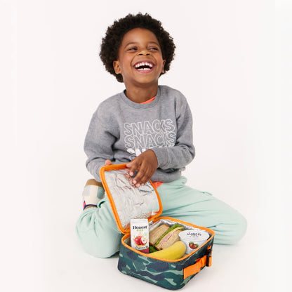 boy with camo lunchbox