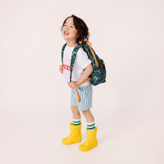 boy in preschool backpack