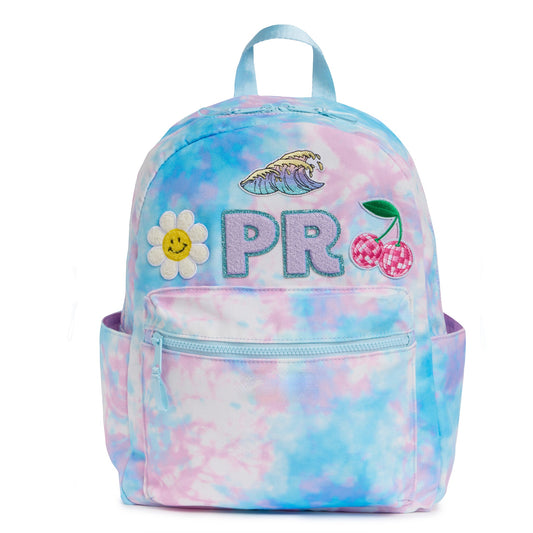 Personalized pastel tie dye kids backpack with custom initials and decorative patches, including a smiley daisy, wave and cherries. Features a front zip pocket, side pockets and spacious storage for school, camp and travel.