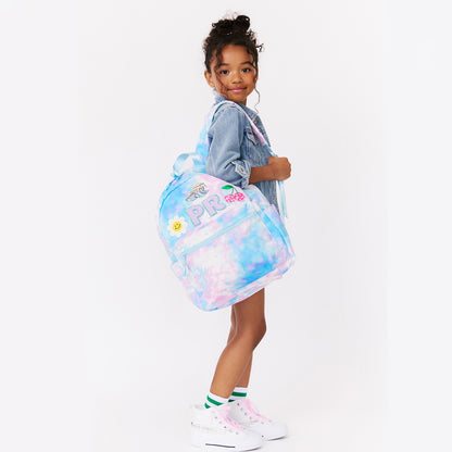 girl holding personalized pink tie dye backpack