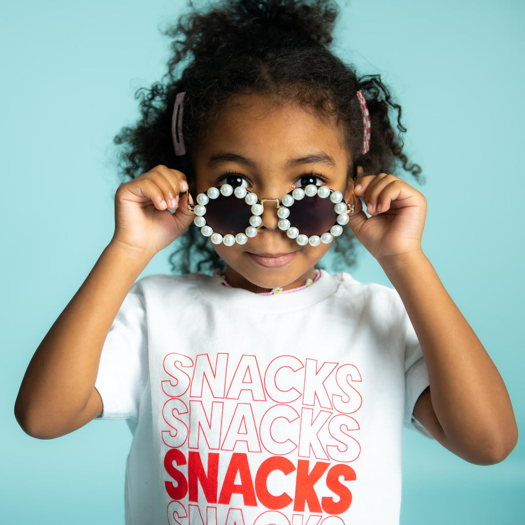 girl wearing a Snacks T-Shirt