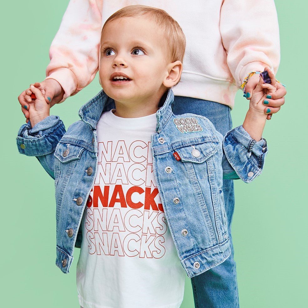 toddler wearing a snacks t-shirt