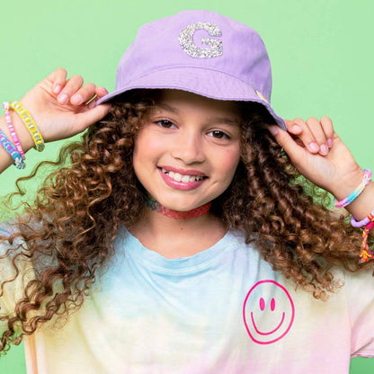 Little girl wearing a custom bucket hat