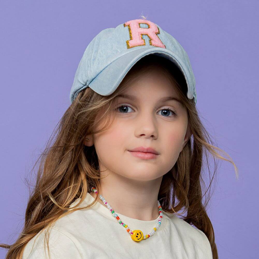 girl wearing a denim Kids Custom Trucker Hat