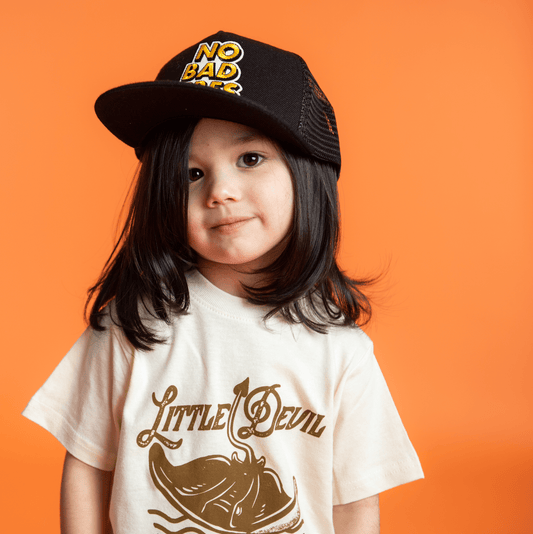 girl wearing a Little Devil T- Shirt