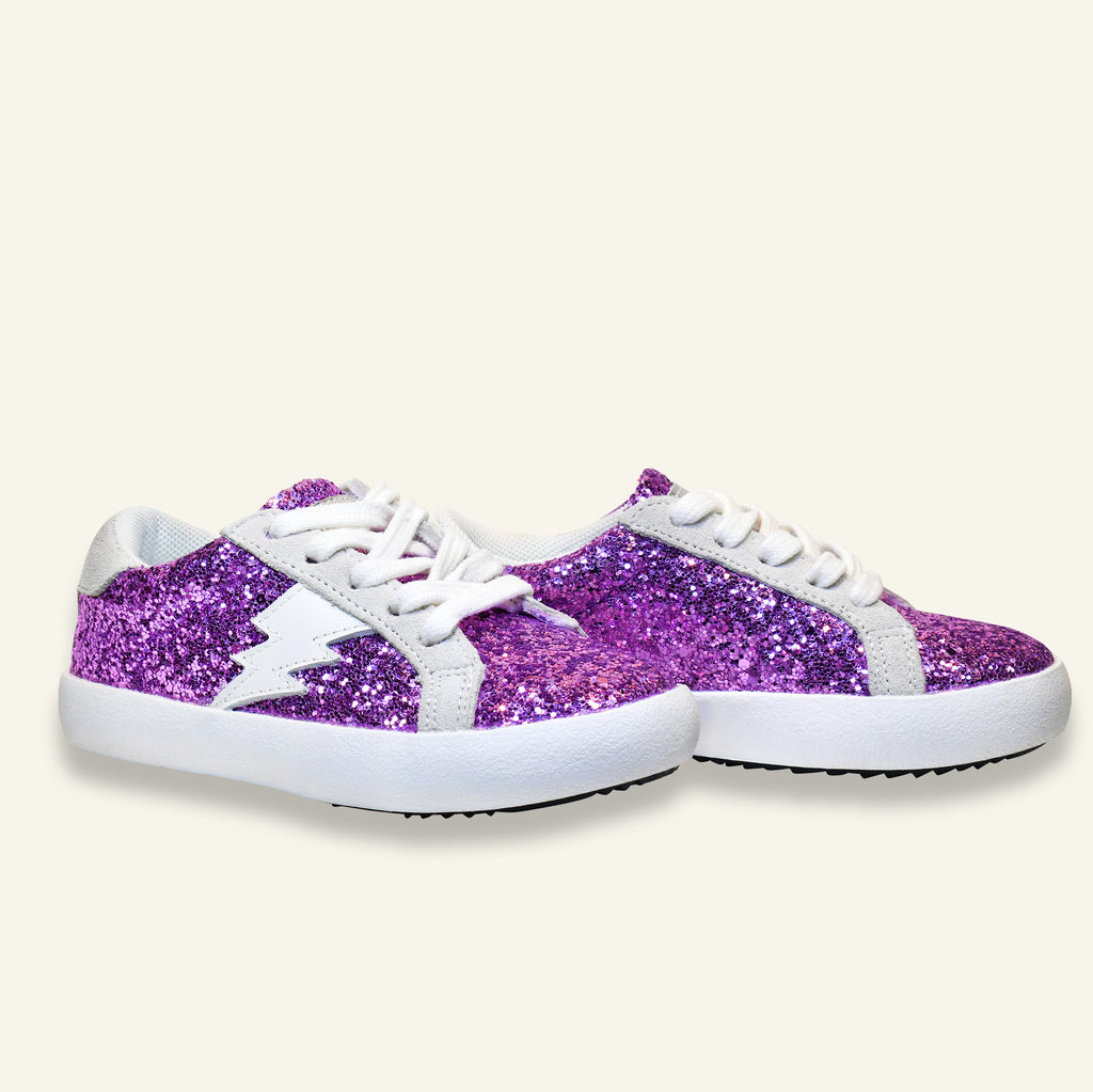 pair of purple glitter ziggy sneakers