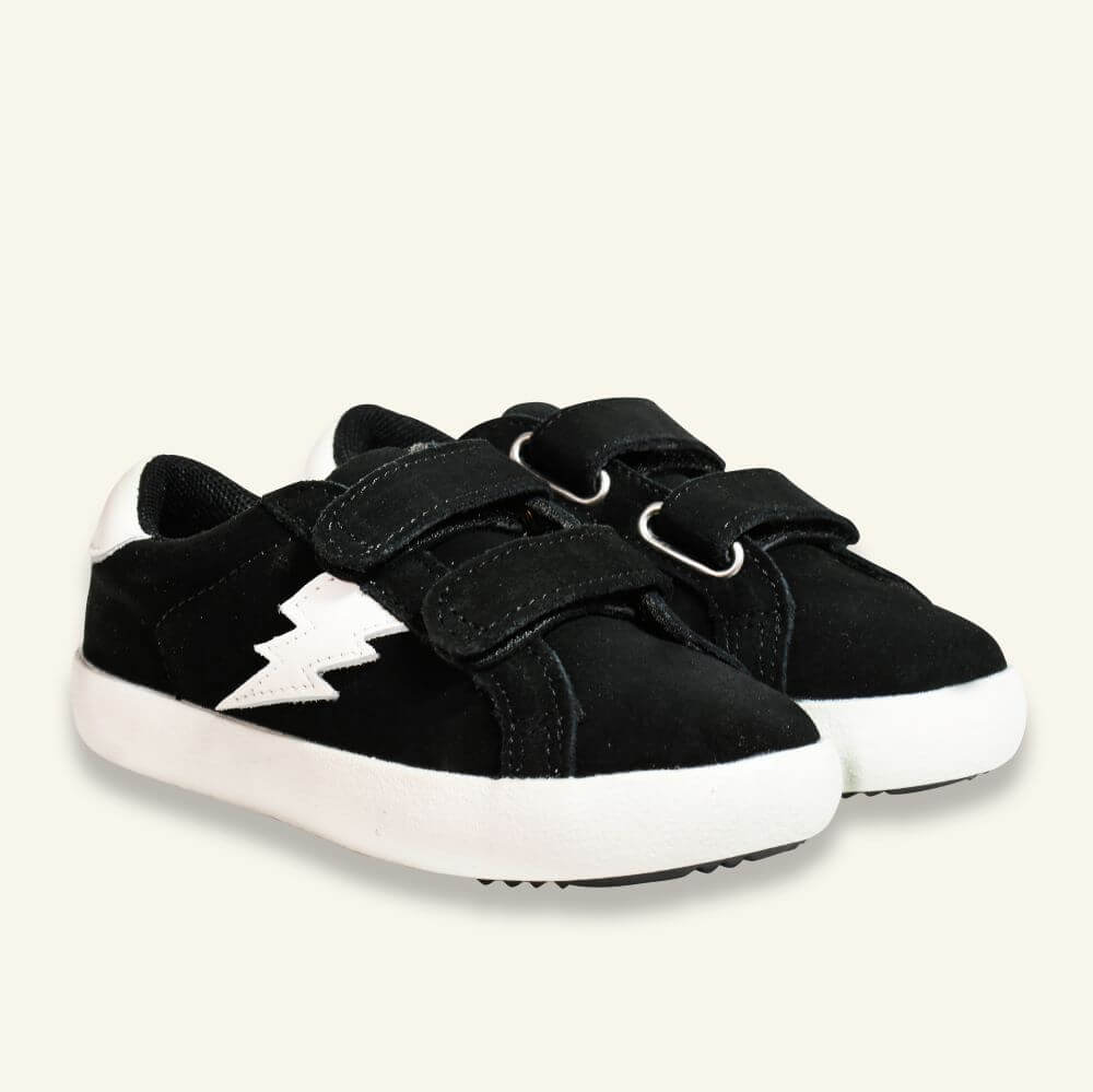 boy's black suede sneakers with lightning bolt decoration and velcro closures